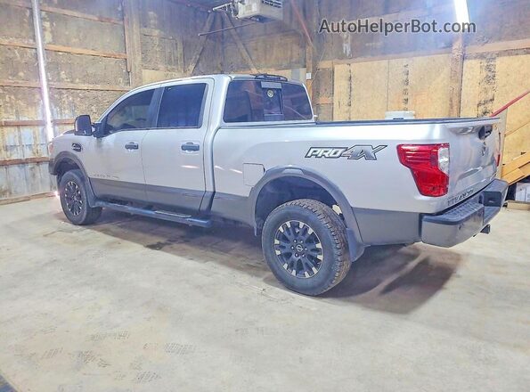 1N6BA1F46KN521247 2019 NISSAN TITAN Silver Rear left