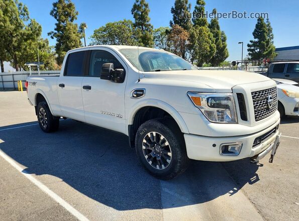 1N6BA1F47KN506563 2019 NISSAN TITAN White Передня права чверть