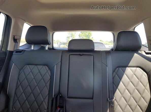 1V2FN2CA1TC525582 2026 VOLKSWAGEN ATLAS Green Rear seats view