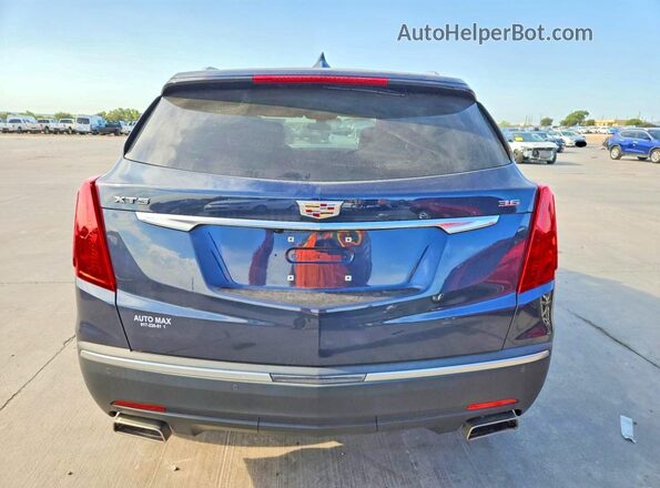 1GYKNARSXJZ198159 2018 CADILLAC XT5 Blue წინა სალონის ხედი