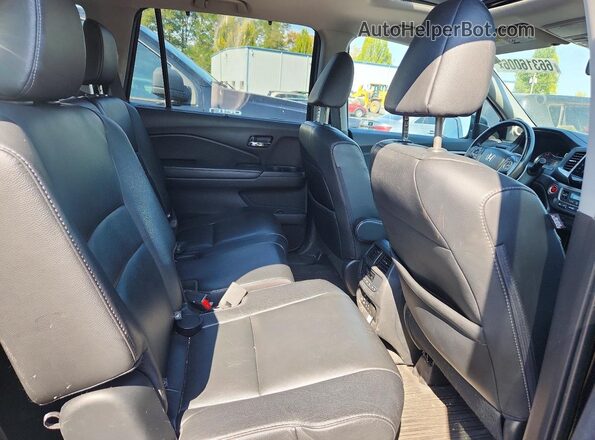 5FNYF6H84GB104159 2016 HONDA PILOT Black Вид задньої частини салону