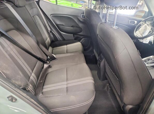 KMHRC8A32SU398521 2025 HYUNDAI VENUE Turquoise Вид задньої частини салону