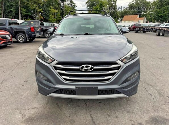 KM8J3CA24HU554624 2017 HYUNDAI TUCSON Black Front interior view