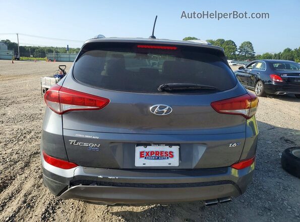 KM8J33A23GU101822 2016 HYUNDAI TUCSON Gray Widok wnętrza z przodu
