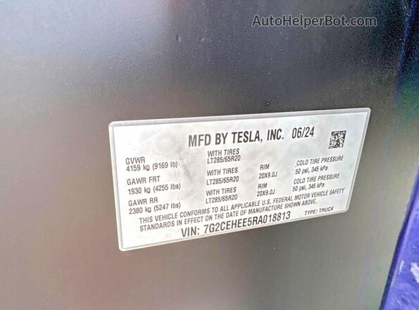 7G2CEHEE5RA018813 2024 TESLA CYBERTRUCK Purple Vista interior trasera