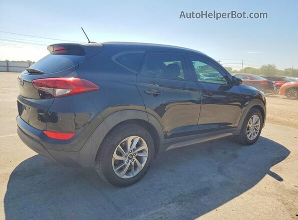 KM8J3CA45GU035632 2016 HYUNDAI TUCSON Black Front right
