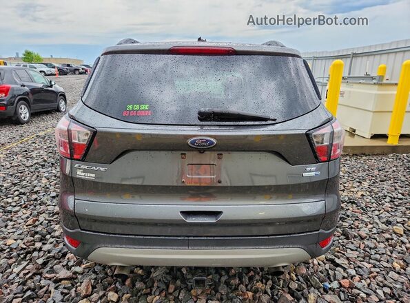 1FMCU9GDXJUA18400 2018 FORD ESCAPE Silver წინა სალონის ხედი