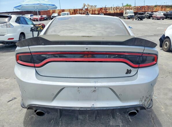 2C3CDXGJ4KH661607 2019 DODGE CHARGER Серебряный Вид сзади