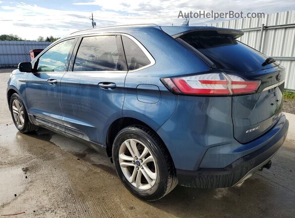 2FMPK3J90KBB83131 2019 FORD EDGE Blue Trasero izquierdo