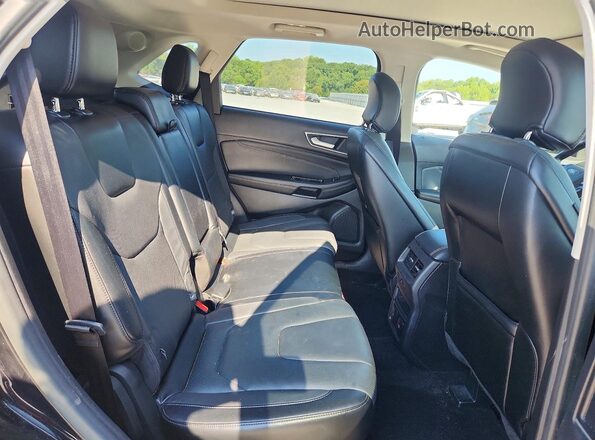 2FMPK3K83GBB47768 2016 FORD EDGE Черный Вид задней части салона