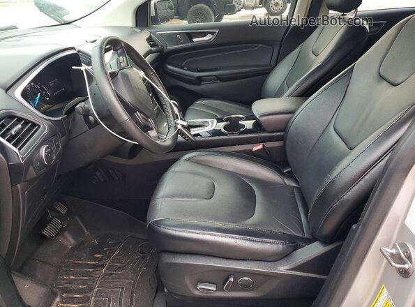 2FMPK3K97JBB43853 2018 FORD EDGE Серебряный Вид салона спереди