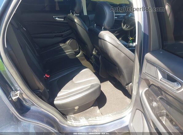 2FMPK3K99KBB69114 2019 FORD EDGE Blue VIN კოდის სტიკერის ხედი
