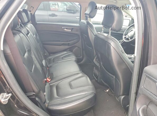 2FMPK3K99KBC64613 2019 FORD EDGE Black Vista interior trasera