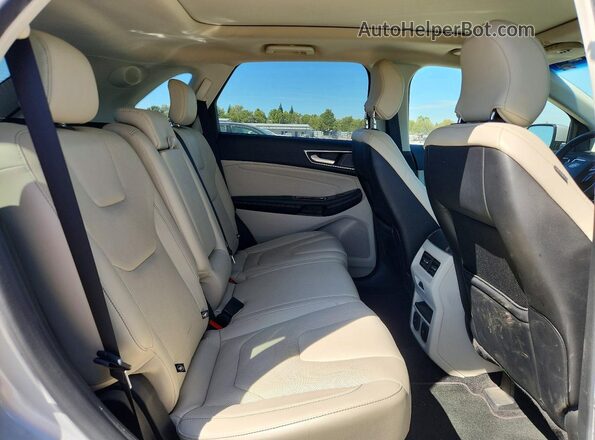 2FMPK3K9XKBB37482 2019 FORD EDGE Silver Rear seats view