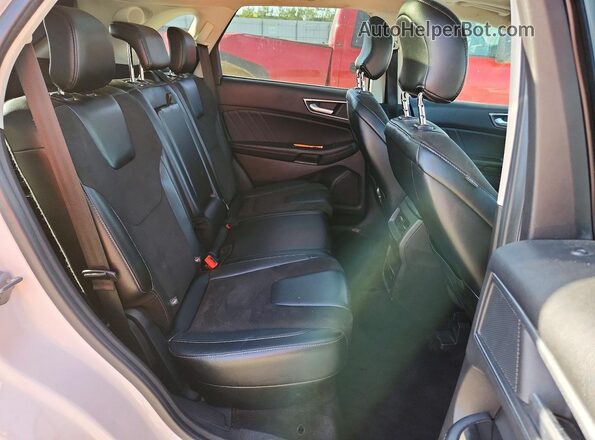 2FMPK4AP4HBC46227 2017 FORD EDGE White Vista de los asientos traseros