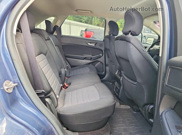 2FMPK4G98KBB07587 2019 FORD EDGE Blue Vista interior trasera