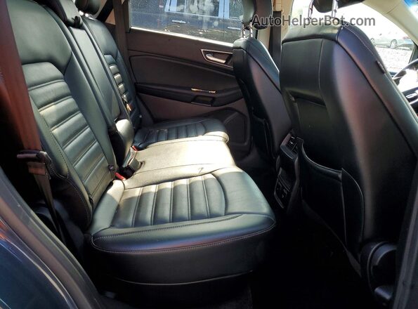 2FMPK4J80GBC64571 2016 FORD EDGE Синий Вид задней части салона