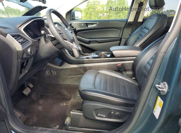 2FMPK4J80GBC64571 2016 FORD EDGE Синий Вид салона спереди