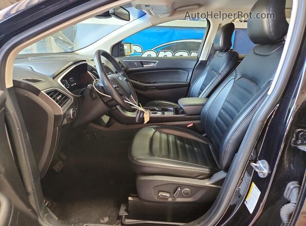 2FMPK4J92KBB90443 2019 FORD EDGE Черный Вид салона спереди