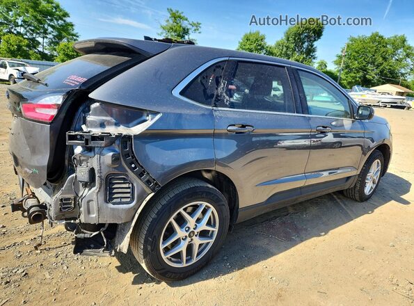 2FMPK4J93PBA39943 2023 FORD EDGE Gray Trasero derecho