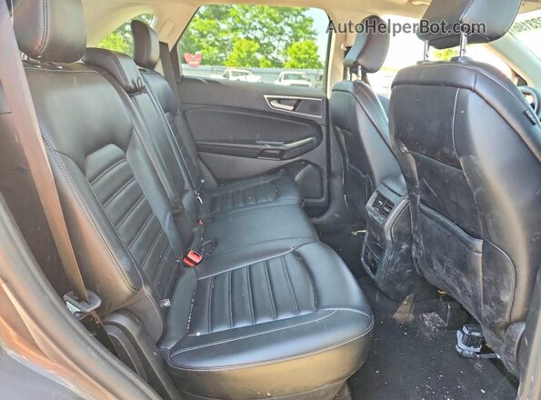 2FMPK4J93PBA39943 2023 FORD EDGE Gray Vista interior trasera