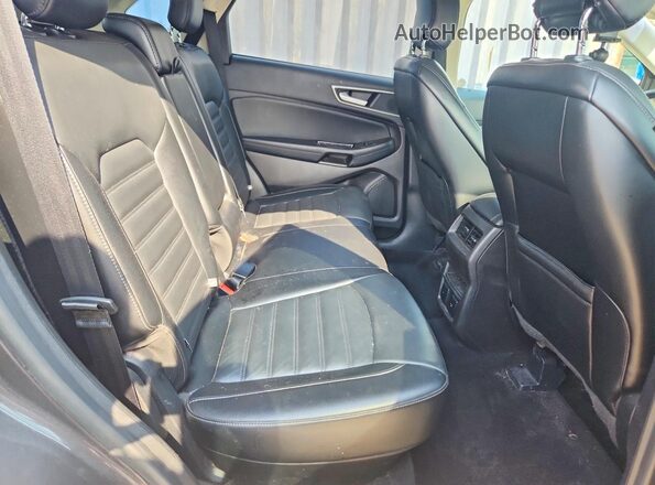 2FMPK4J94HBC30112 2017 FORD EDGE Серый Вид задней части салона