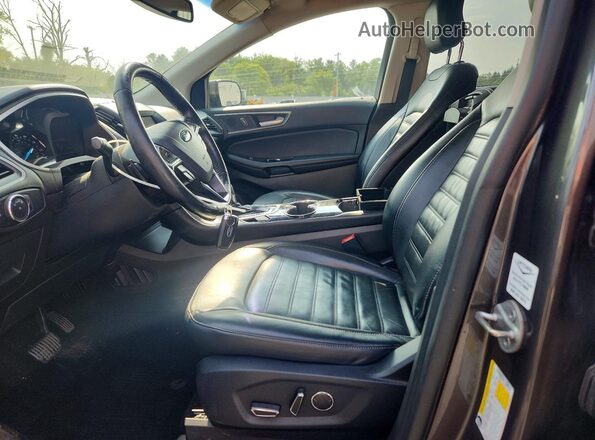 2FMPK4J94HBC30112 2017 FORD EDGE Серый Вид салона спереди