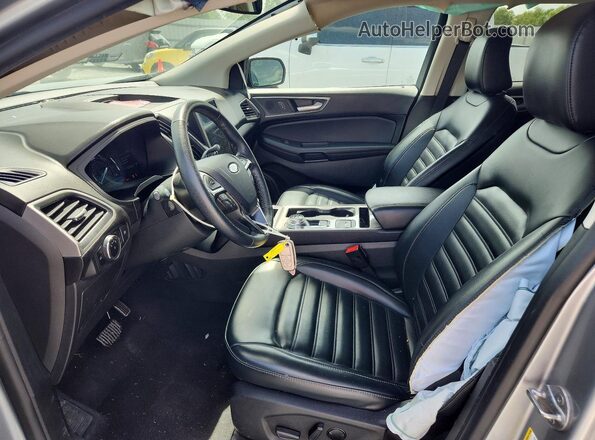 2FMPK4J94RBA95165 2024 FORD EDGE Серебряный Вид салона спереди