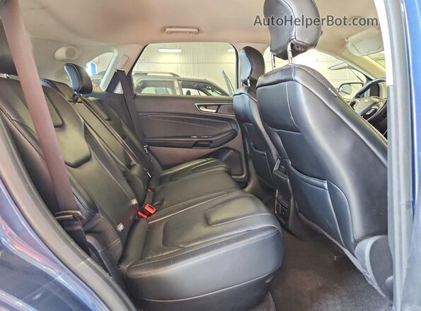 2FMPK4K90KBB88091 2019 FORD EDGE Blue Вид задньої частини салону