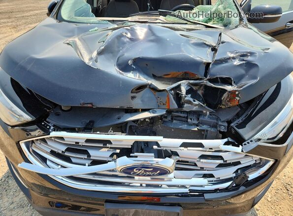 2FMPK4K91RBA37867 2024 FORD EDGE Black Widok wnętrza z tyłu