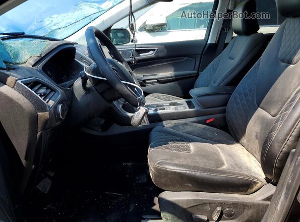 2FMPK4K91RBA37867 2024 FORD EDGE Black Widok wnętrza z przodu
