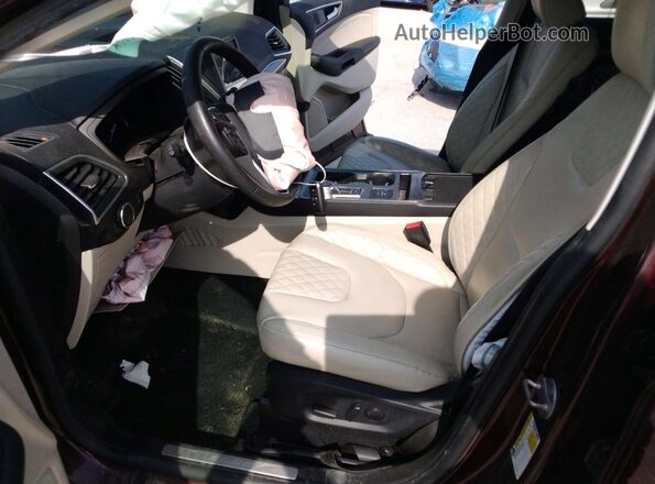 2FMPK4K92RBA82848 2024 FORD EDGE Burgundy Vista interior delantera