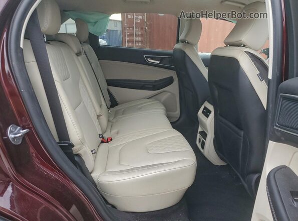 2FMPK4K92RBA82848 2024 FORD EDGE Burgundy Vista interior trasera