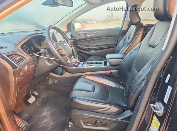 2FMPK4K93NBA55149 2022 FORD EDGE Черный Вид салона спереди