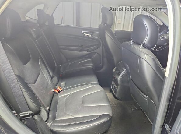2FMPK4K95KBB68404 2019 FORD EDGE Черный Вид задней части салона