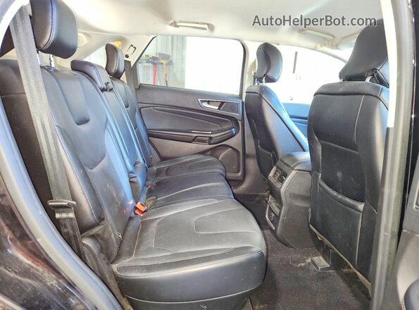 2FMPK4K96HBB11914 2017 FORD EDGE Black Vista interior trasera