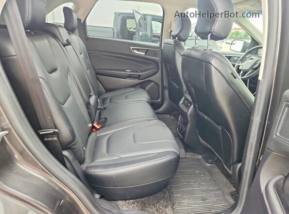 2FMPK4K98JBC31123 2018 FORD EDGE Gray Vista interior trasera