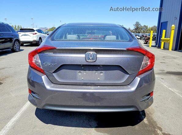 2HGFC2F56GH555560 2016 HONDA CIVIC Gray Vista trasera