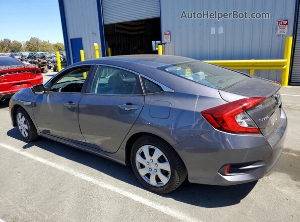 2HGFC2F56GH555560 2016 HONDA CIVIC Gray Trasero izquierdo