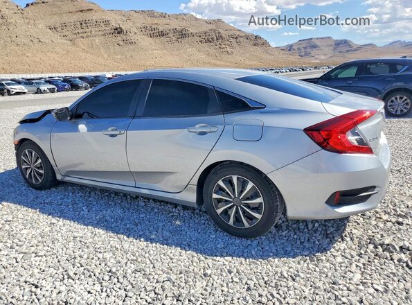 2HGFC2F56HH543054 2017 HONDA CIVIC Silver Trasero izquierdo