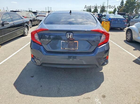 2HGFC2F74JH606367 2018 HONDA CIVIC Blue Rear view