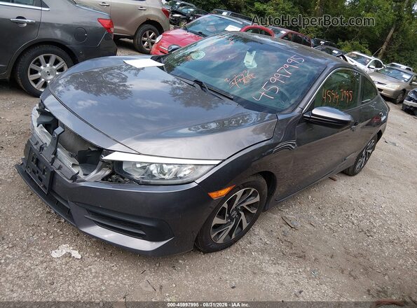 2HGFC4B00GH304314 2016 HONDA CIVIC Gray Vista tres cuartos delantera izquierda