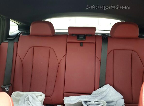 2HGFE1E51TH478306 2026 HONDA CIVIC Red Rear seats view