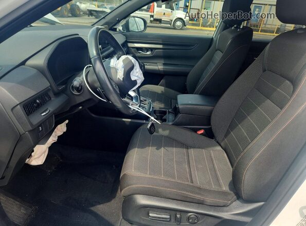 2HKRS6H56PH816079 2023 HONDA CR-V Белый Вид салона спереди