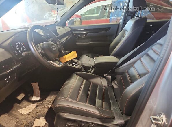 2HKRS6H9XPH200890 2023 HONDA CR-V Silver Front interior view