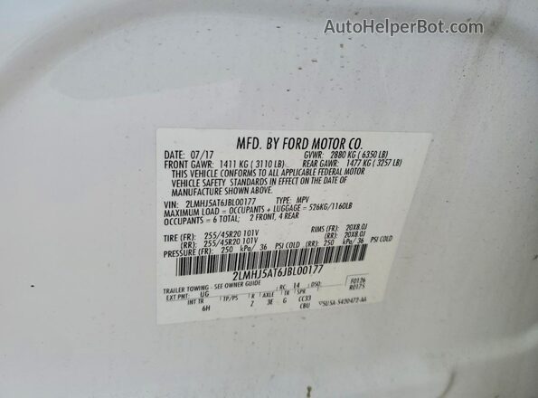 2LMHJ5AT6JBL00177 2018 LINCOLN MKT White VIN კოდის სტიკერის ხედი