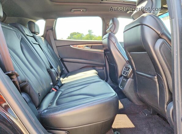 2LMTJ8LR7GBL70292 2016 LINCOLN MKX Black Սալոնի հետևի տեսք