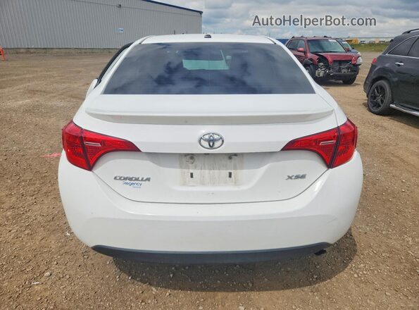 2T1BURHE1JC989953 2018 TOYOTA COROLLA Белый Вид сзади