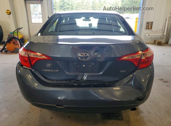 2T1BURHE2HC898944 2017 TOYOTA COROLLA Gray Rear view