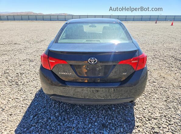 2T1BURHE2KC153795 2019 TOYOTA COROLLA Black Вид ззаду